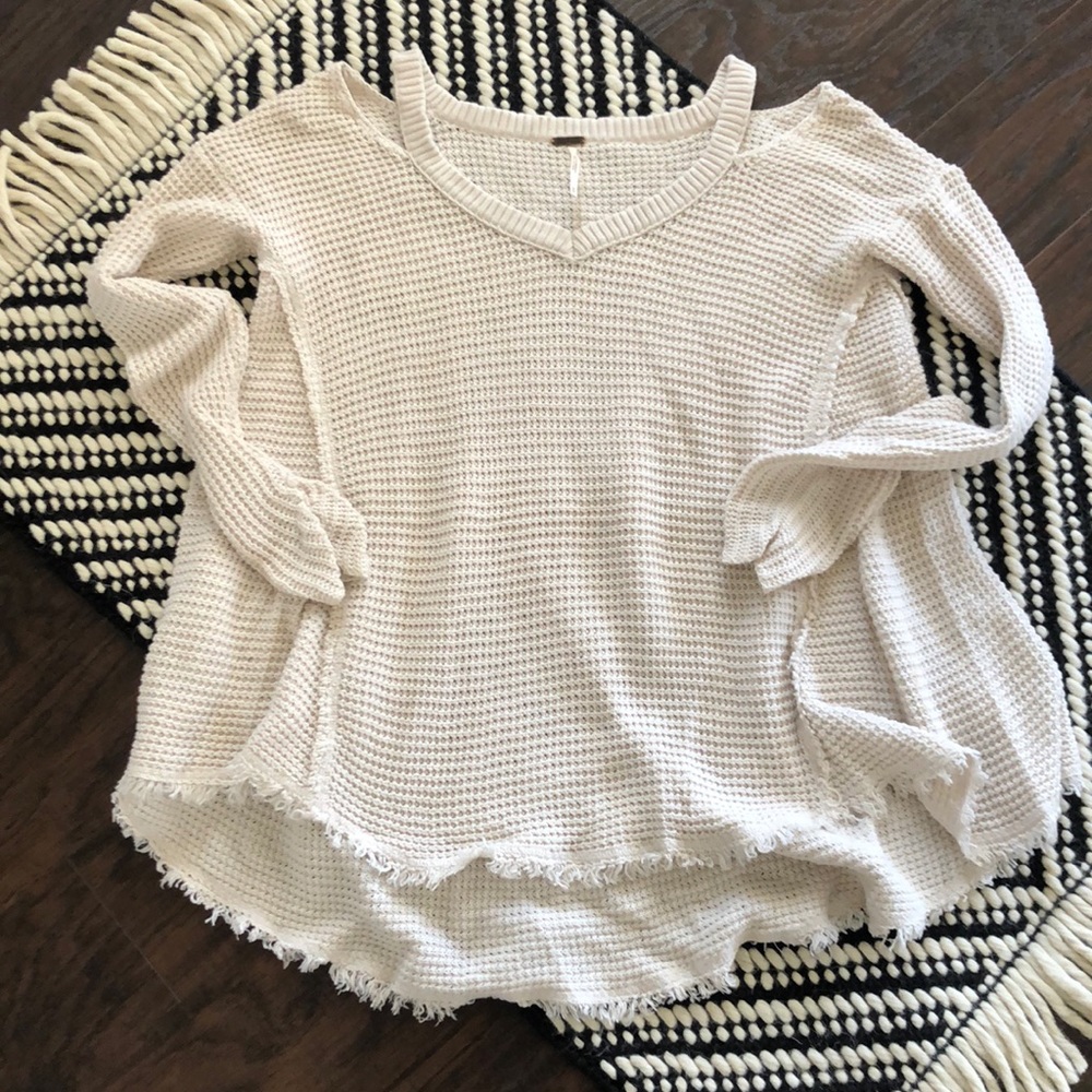Free people shoulder cut out sweater.